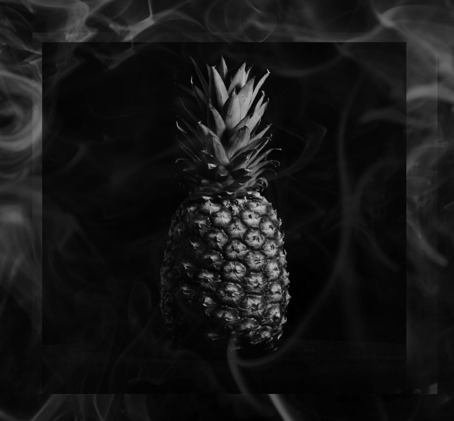 Refreshing Smoked Pineapple Mojito - a tropical twist with a hint of smokiness, perfect for a summer day.